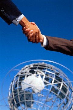 Business Handshake Before Globe